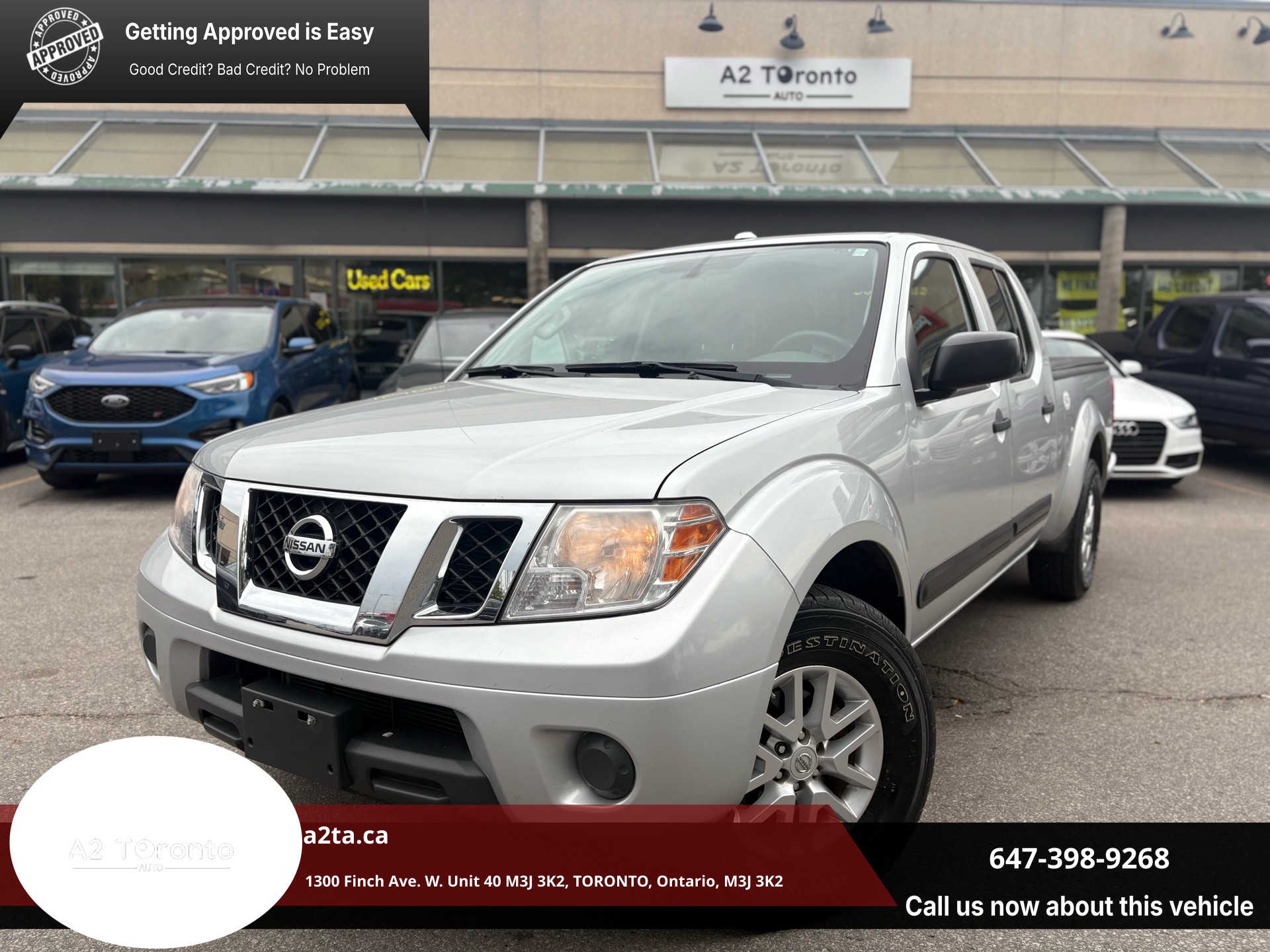 Silver 2014 Nissan Frontier Pickup Truck Automatic