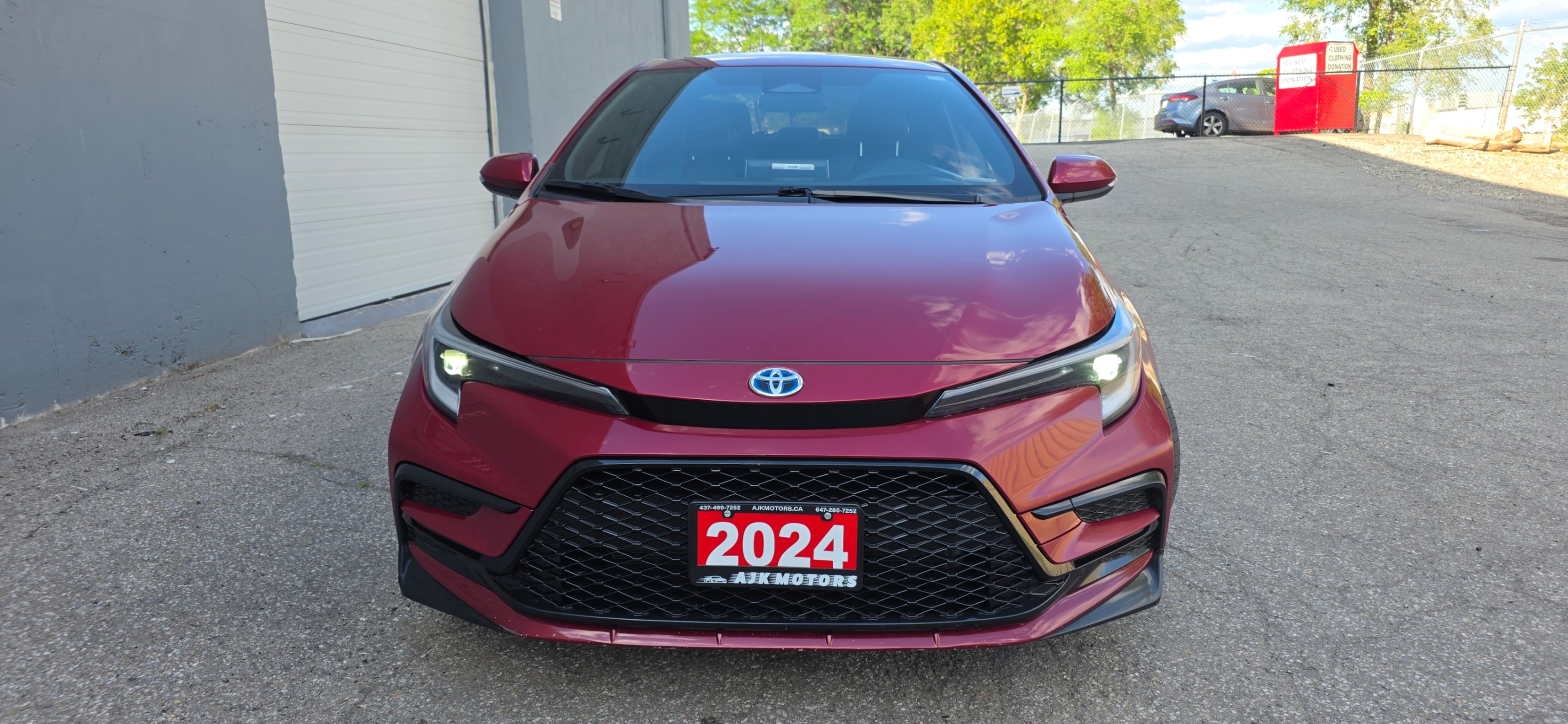 Red 2024 Toyota Corolla Hybrid Sedan Automatic