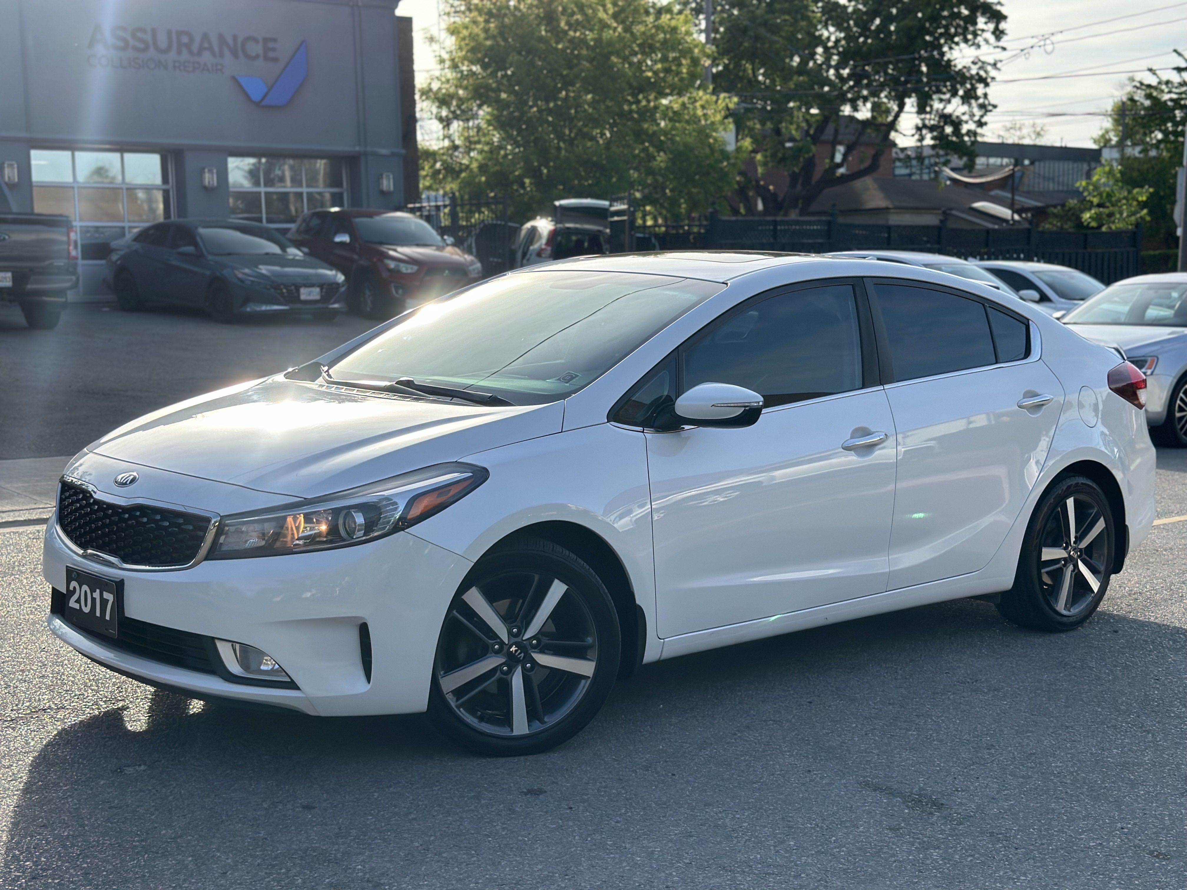 White 2017 Kia Forte EX Sedan Front-Wheel Drive Automatic