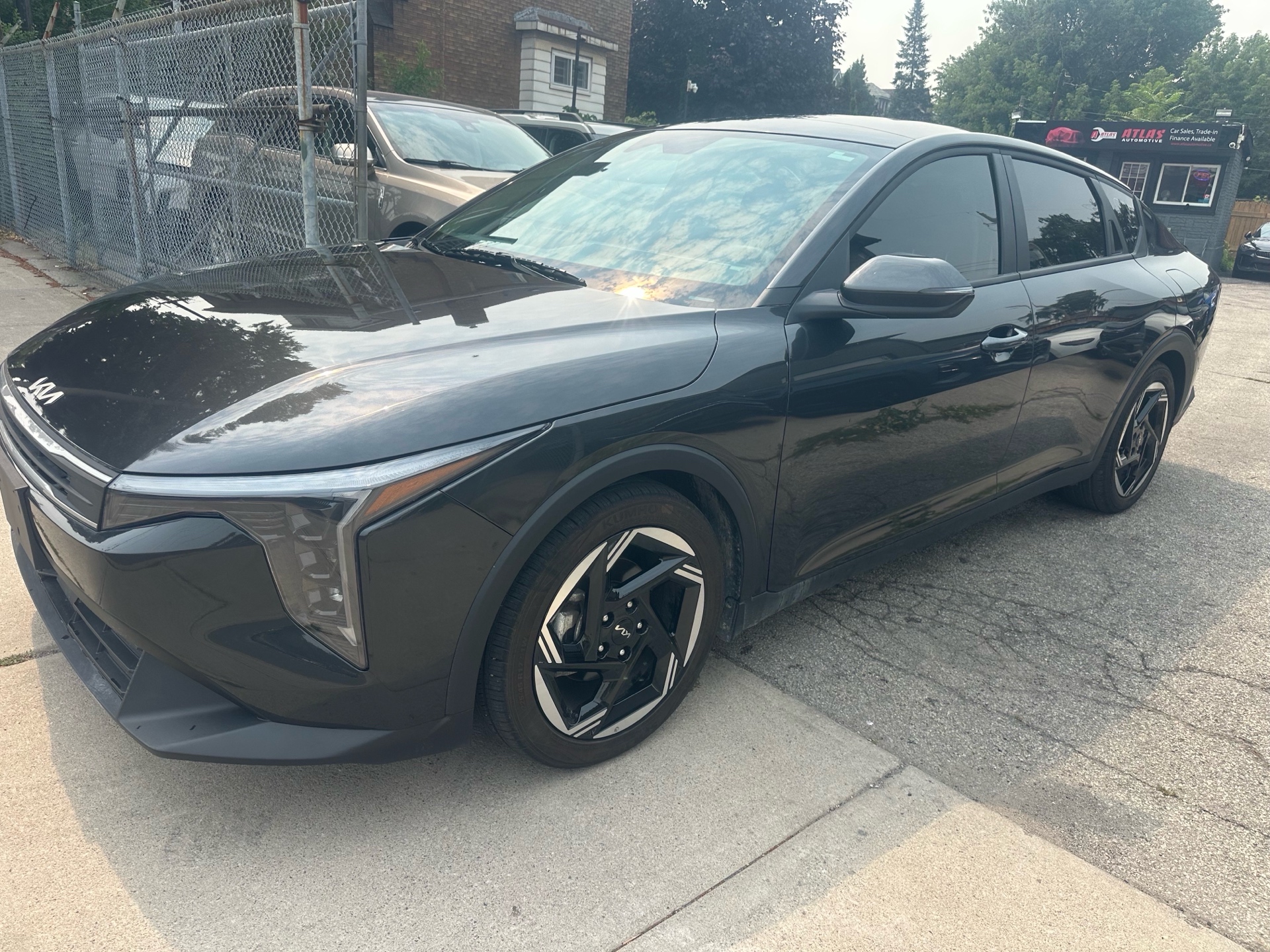 Gray 2025 Kia K4 Sedan Front-Wheel Drive Automatic