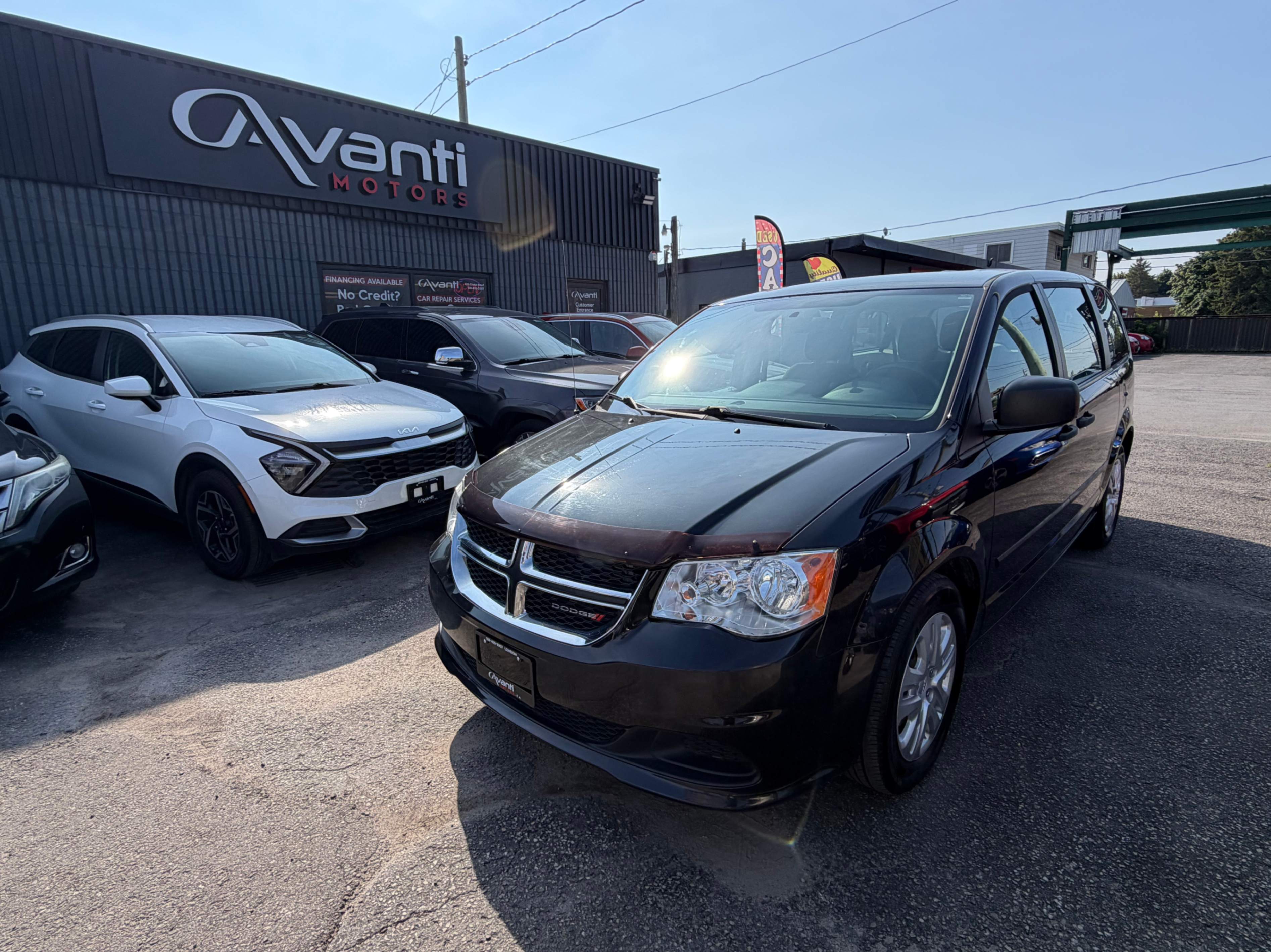 Black 2015 Dodge Grand Caravan Minivan Front-Wheel Drive Automatic