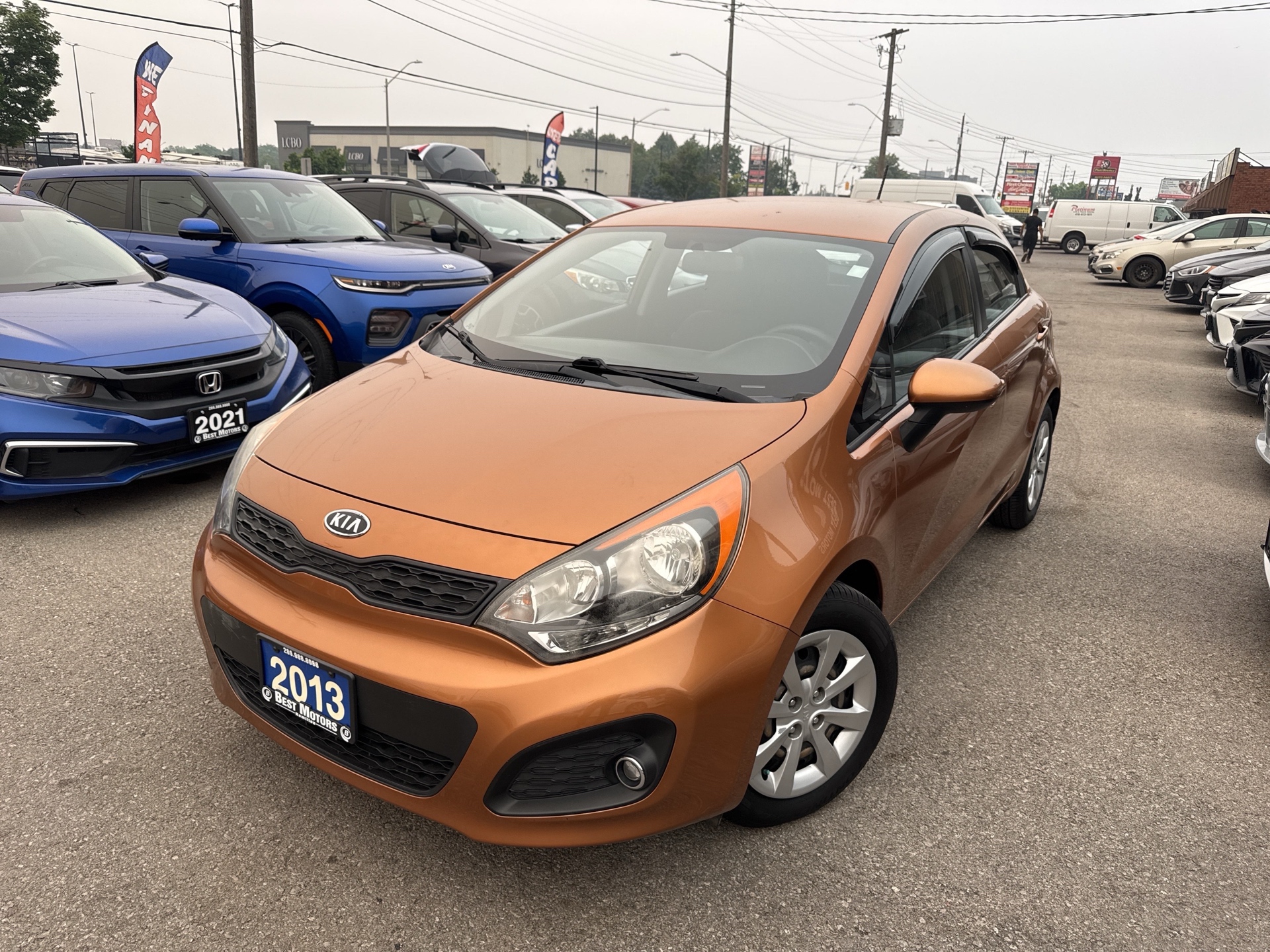 Orange Twister 2013 Kia Rio Sedan Front-Wheel Drive Automatic