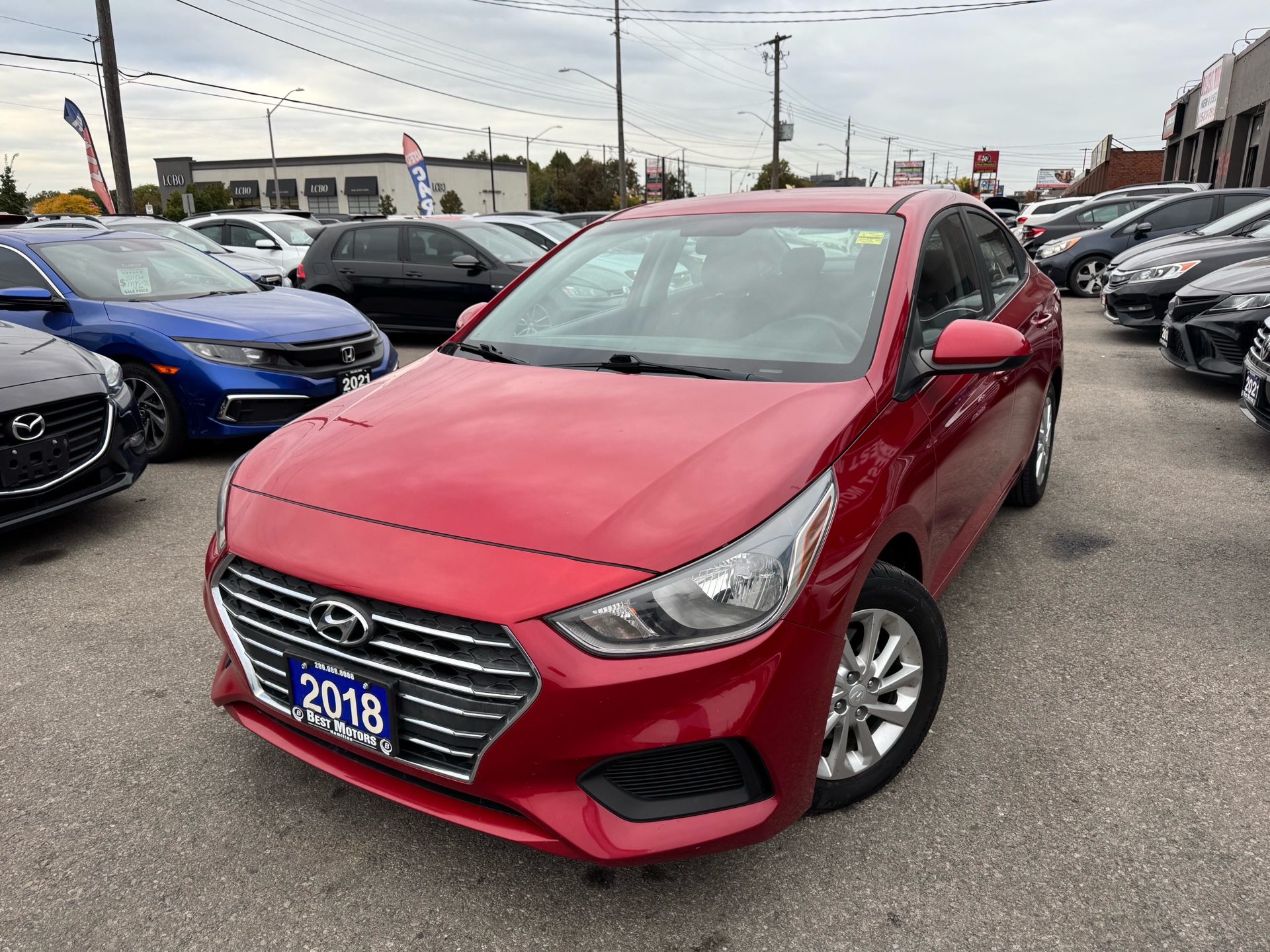 Red 2018 Hyundai Accent Sedan Front-Wheel Drive Automatic