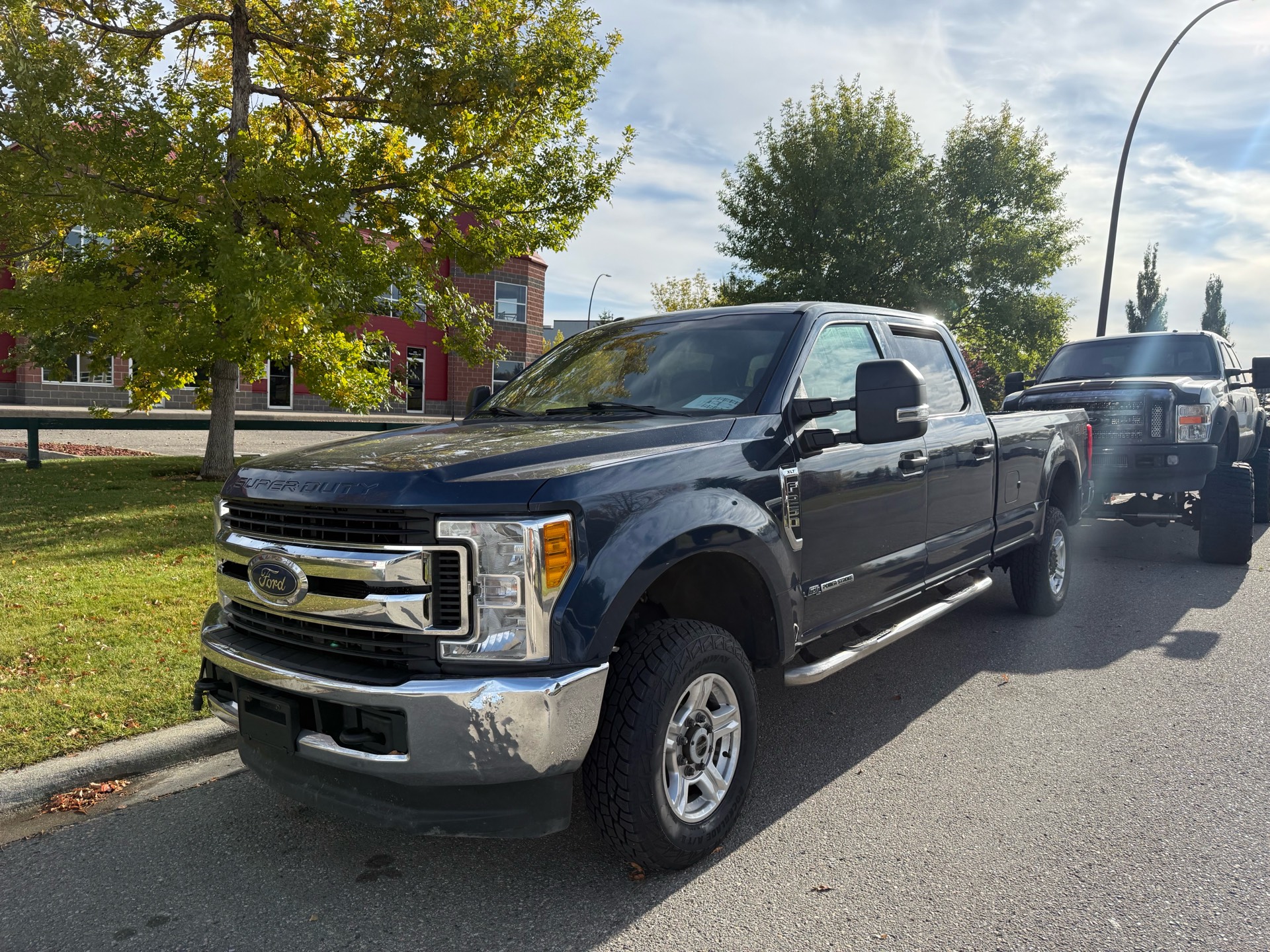 Blue 2017 Ford F-250 Super Duty Pickup Truck Four-Wheel Drive Automatic