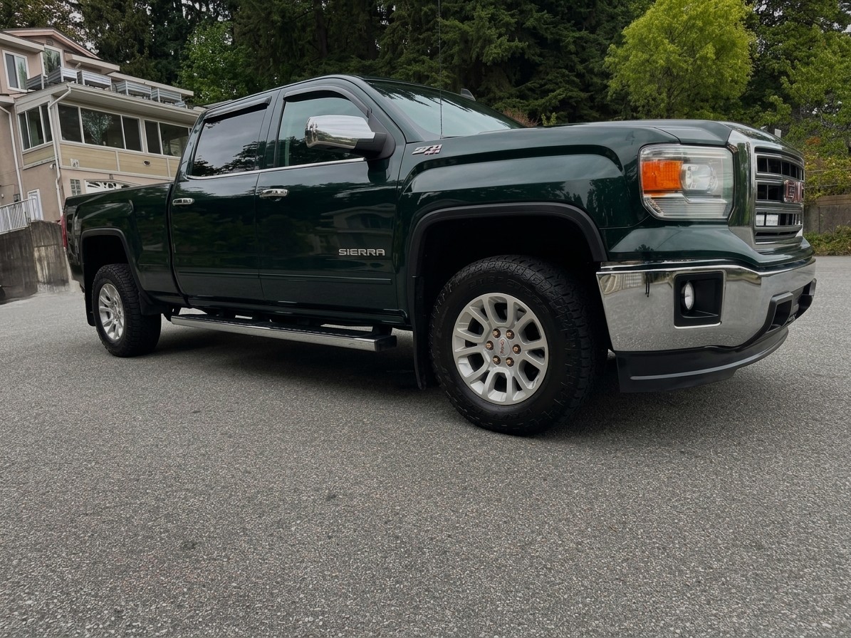 Green 2015 GMC Sierra 1500 Pickup Truck Four-Wheel Drive Automatic