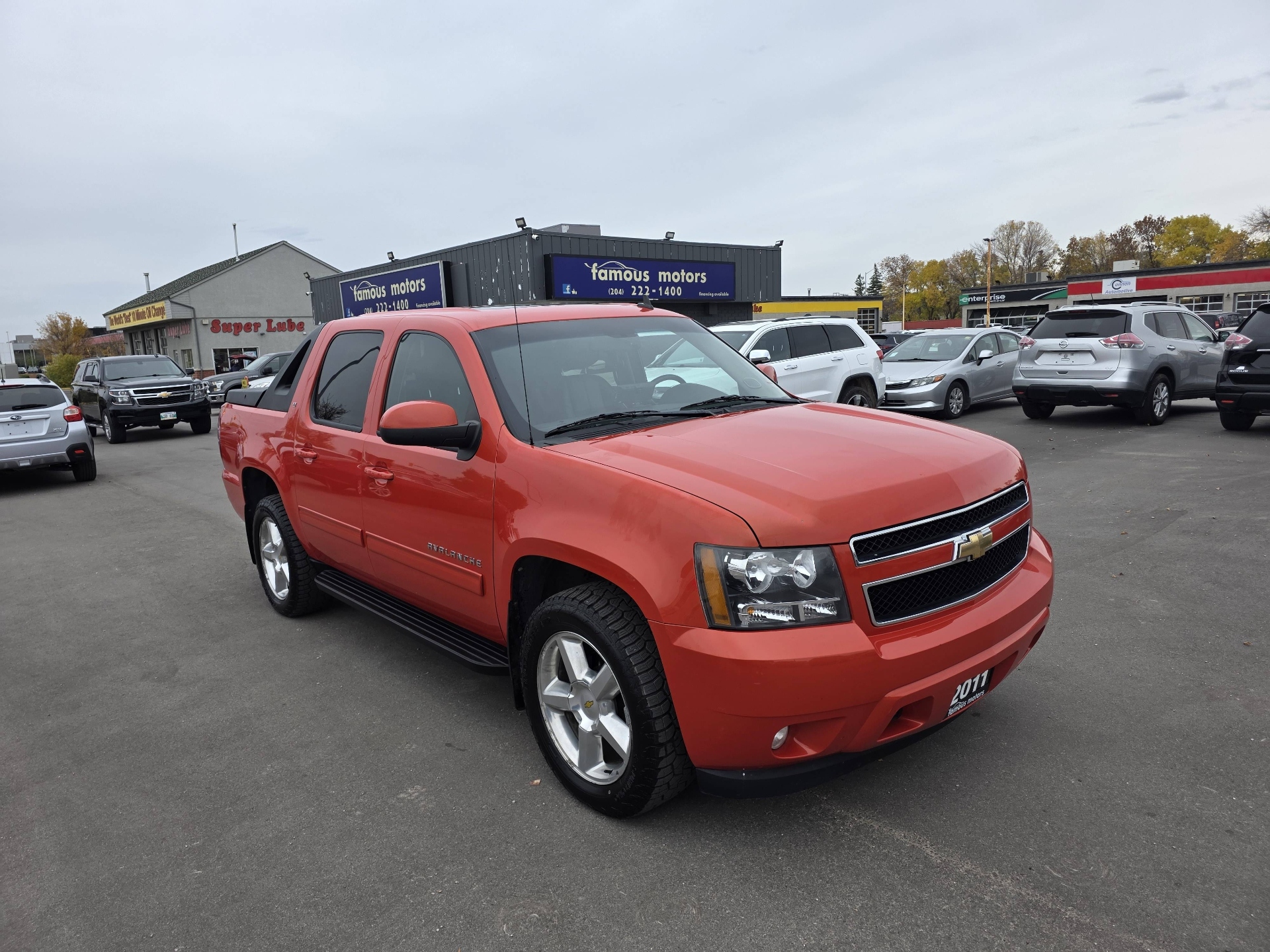 Red 2011 Chevrolet Avalanche Pickup Truck Four-Wheel Drive Automatic