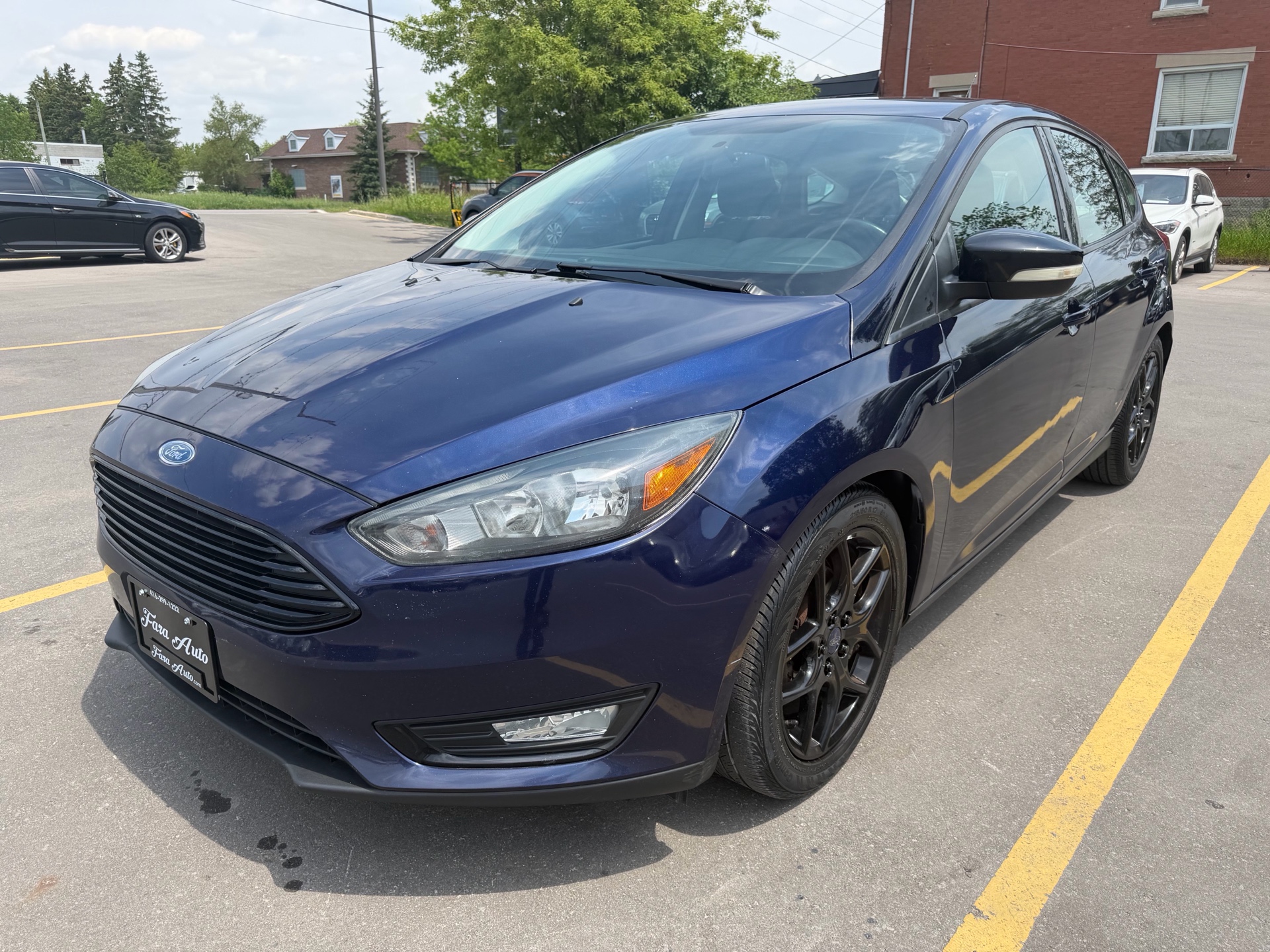 Blue 2016 Ford Focus SE Hatchback Hatchback Front-Wheel Drive Automatic