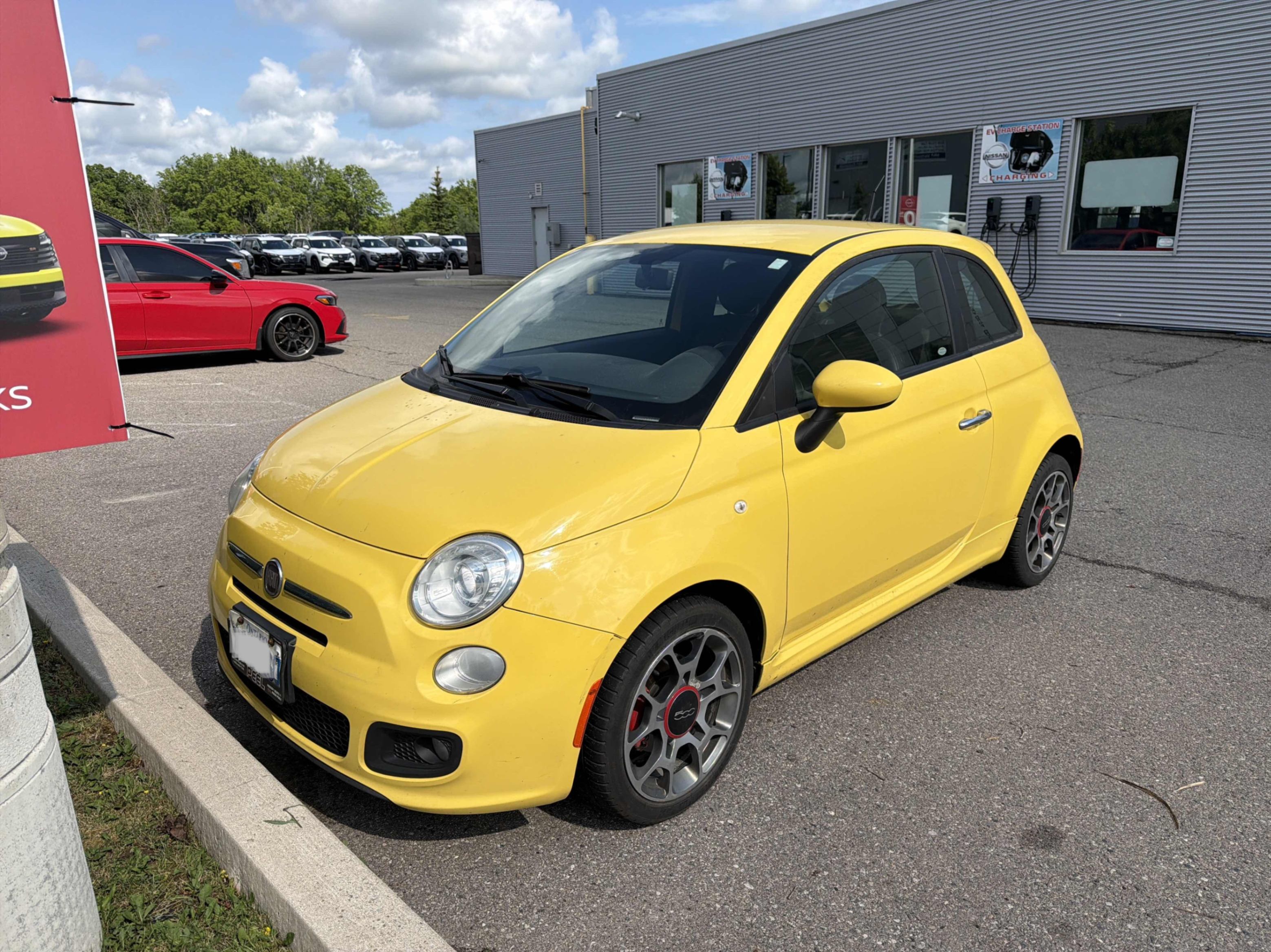 Yellow 2012 FIAT 500 Hatchback Front-Wheel Drive 5-Speed Manual