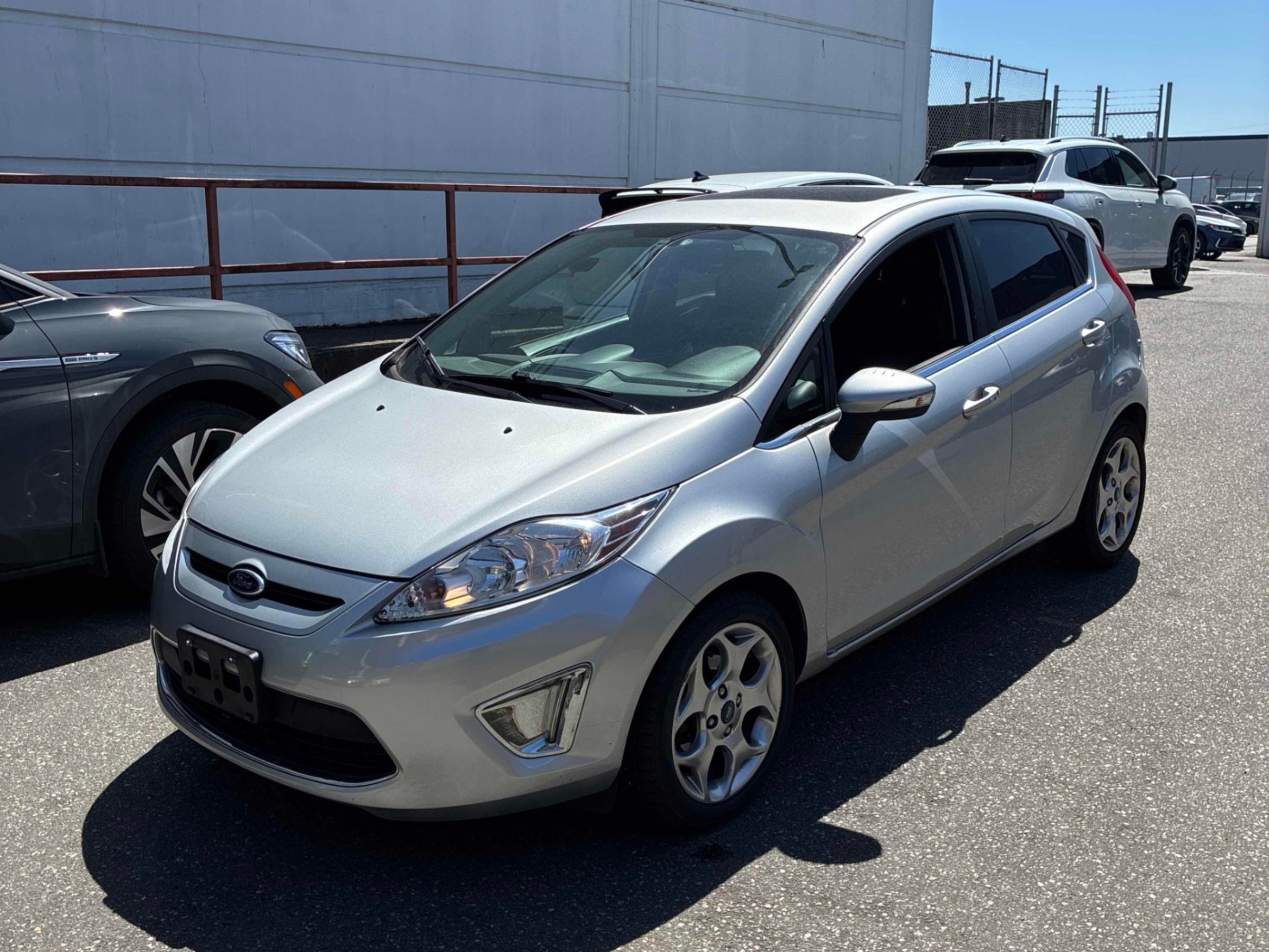 Silver 2013 Ford Fiesta Titanium Hatchback Hatchback Front-Wheel Drive Automatic