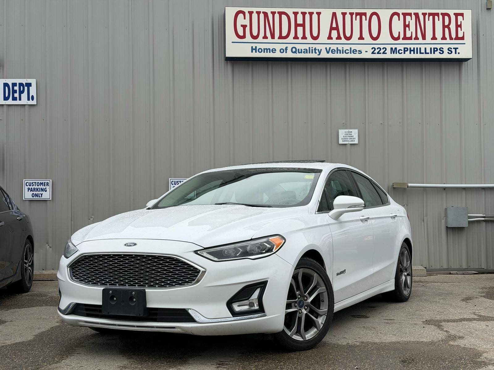 White 2019 Ford Fusion Hybrid Titanium FWD Sedan Front-Wheel Drive Automatic