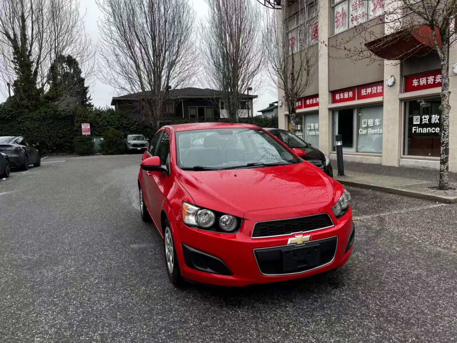 Red 2012 Chevrolet Sonic 1LT Sedan FWD Sedan Front-Wheel Drive Automatic