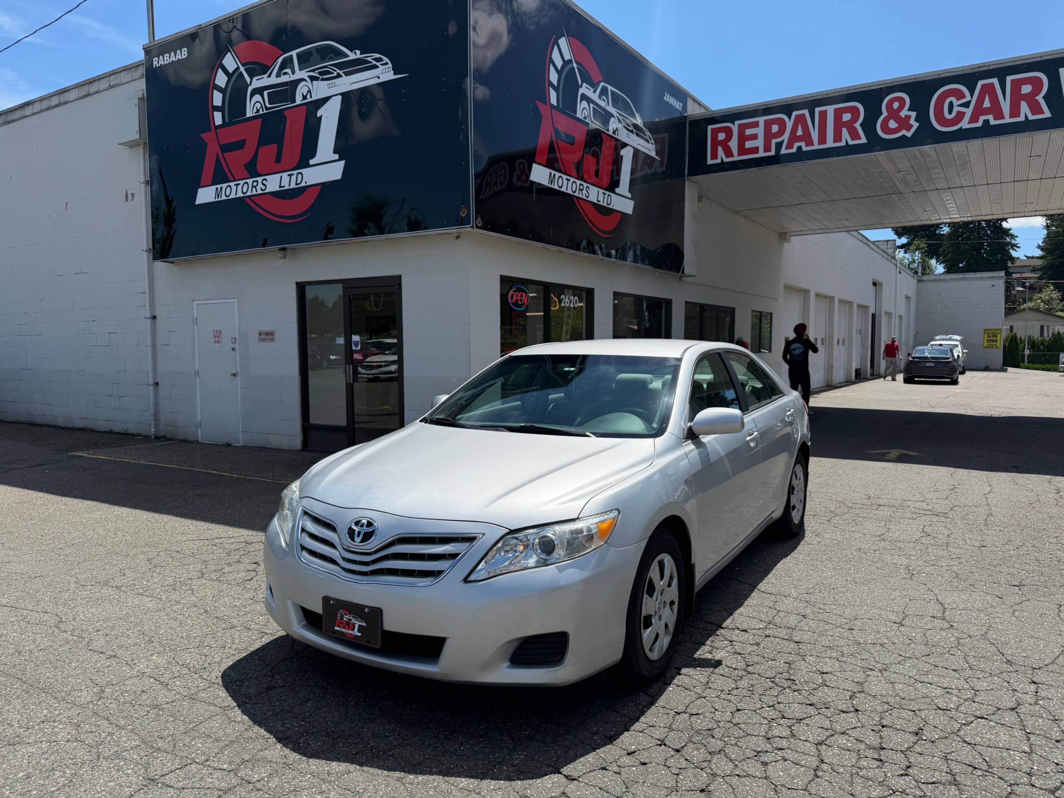 Silver 2010 Toyota Camry LE Sedan Front-Wheel Drive Automatic