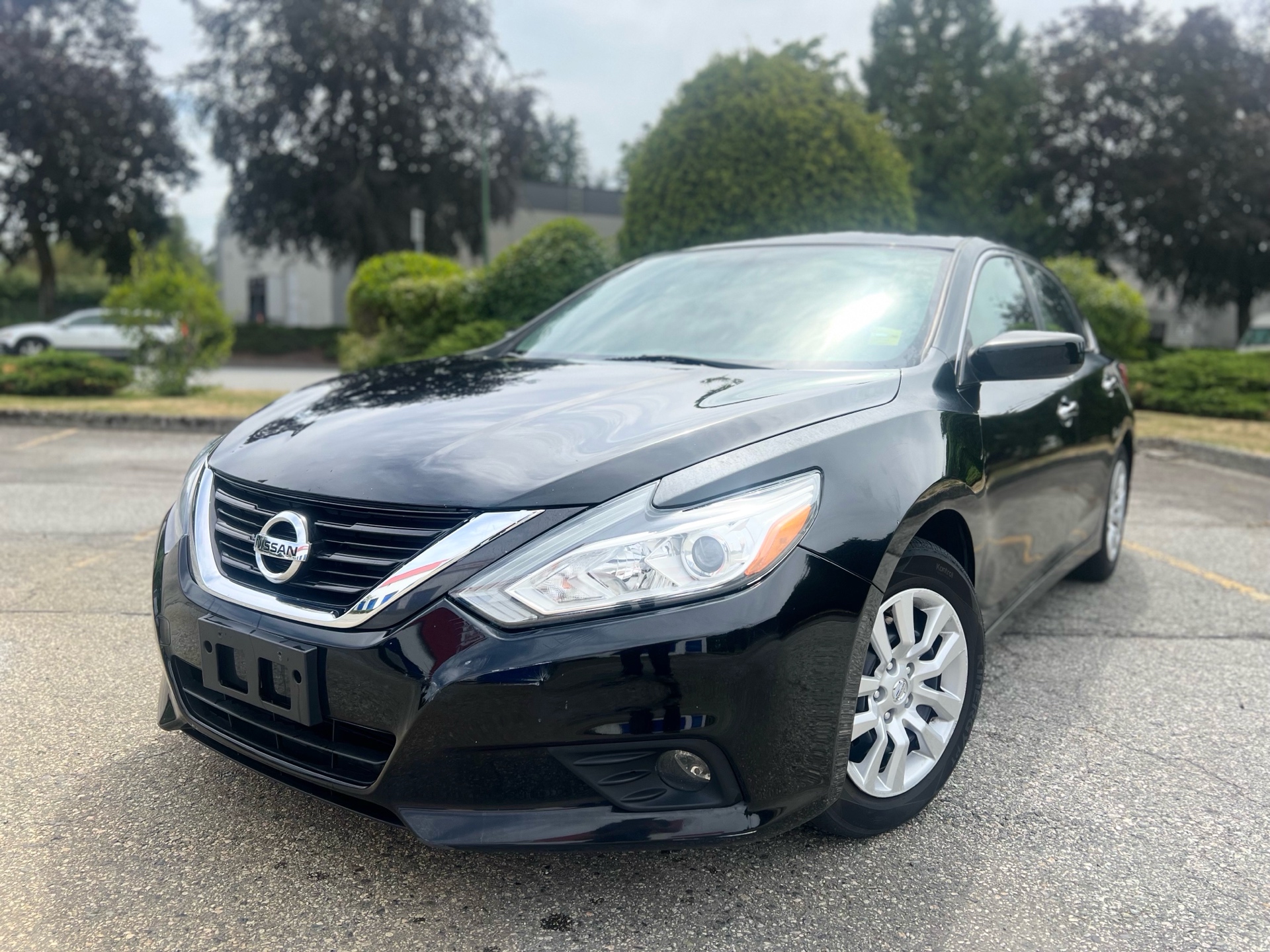 Black 2016 Nissan Altima Sedan Front-Wheel Drive Automatic