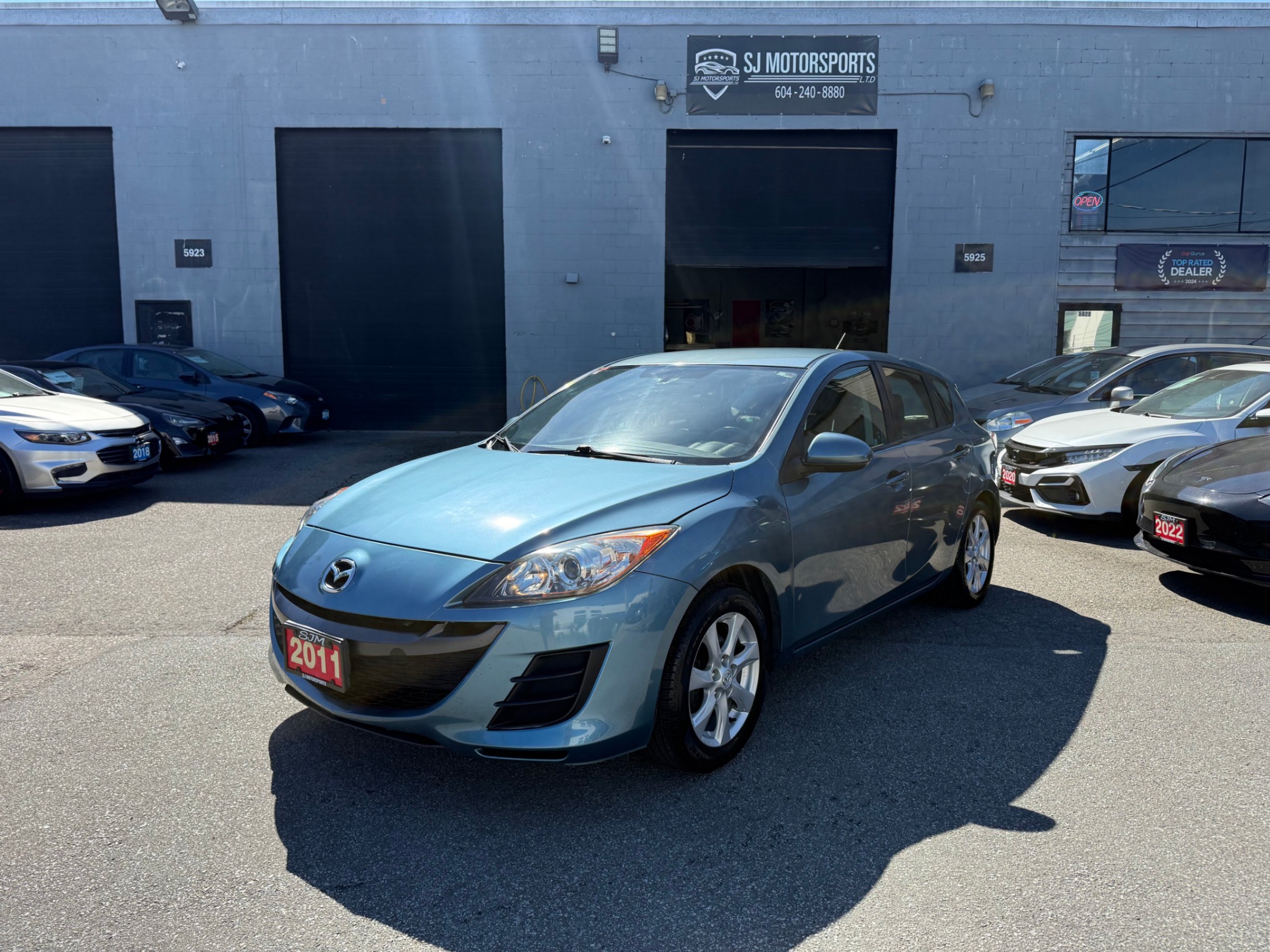 Metallic Surf Blue 2011 Mazda MAZDA3 Sport GX Wagon Automatic