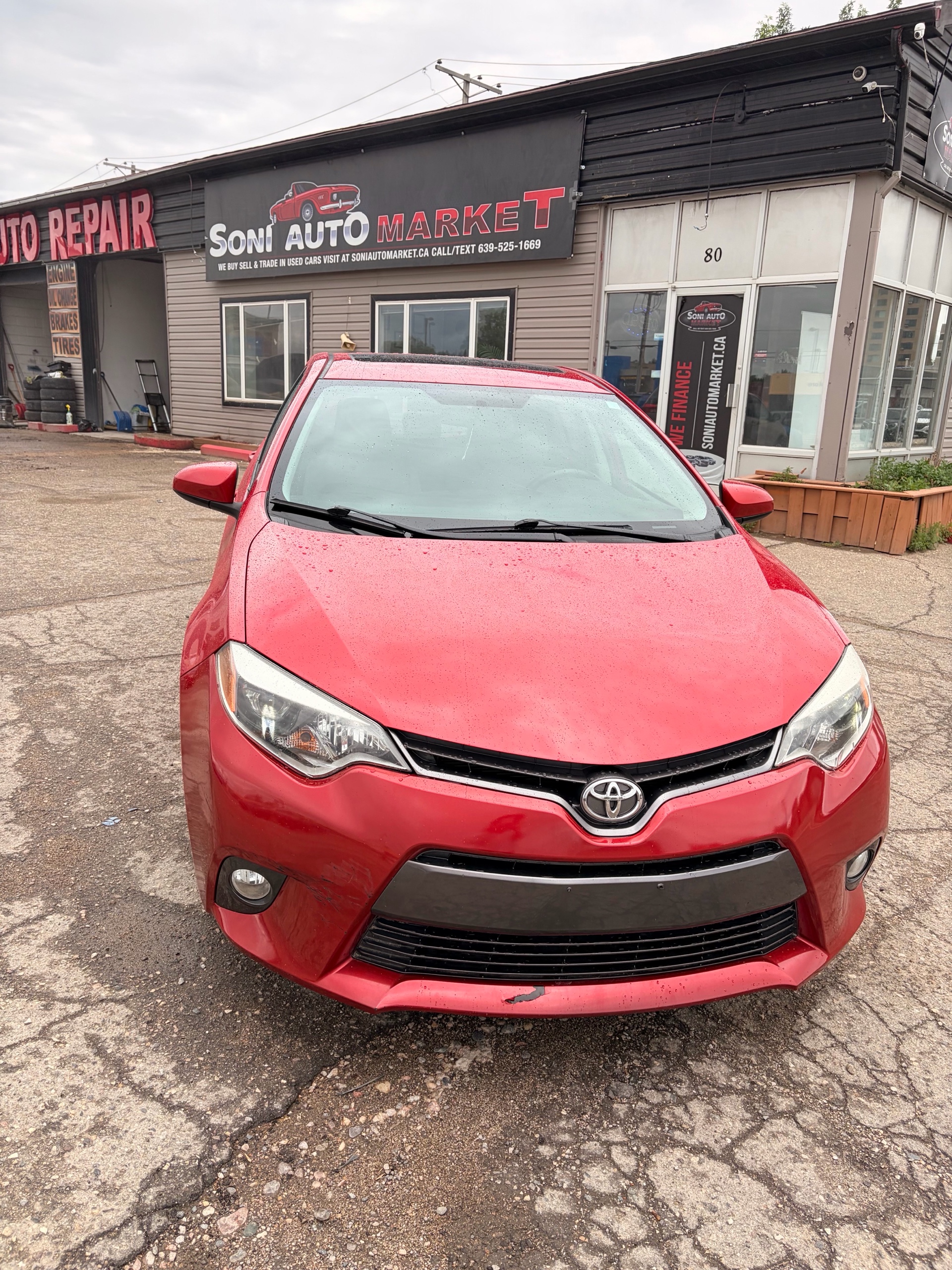 Metallic Torino Red 2015 Toyota Corolla CE Sedan Automatic