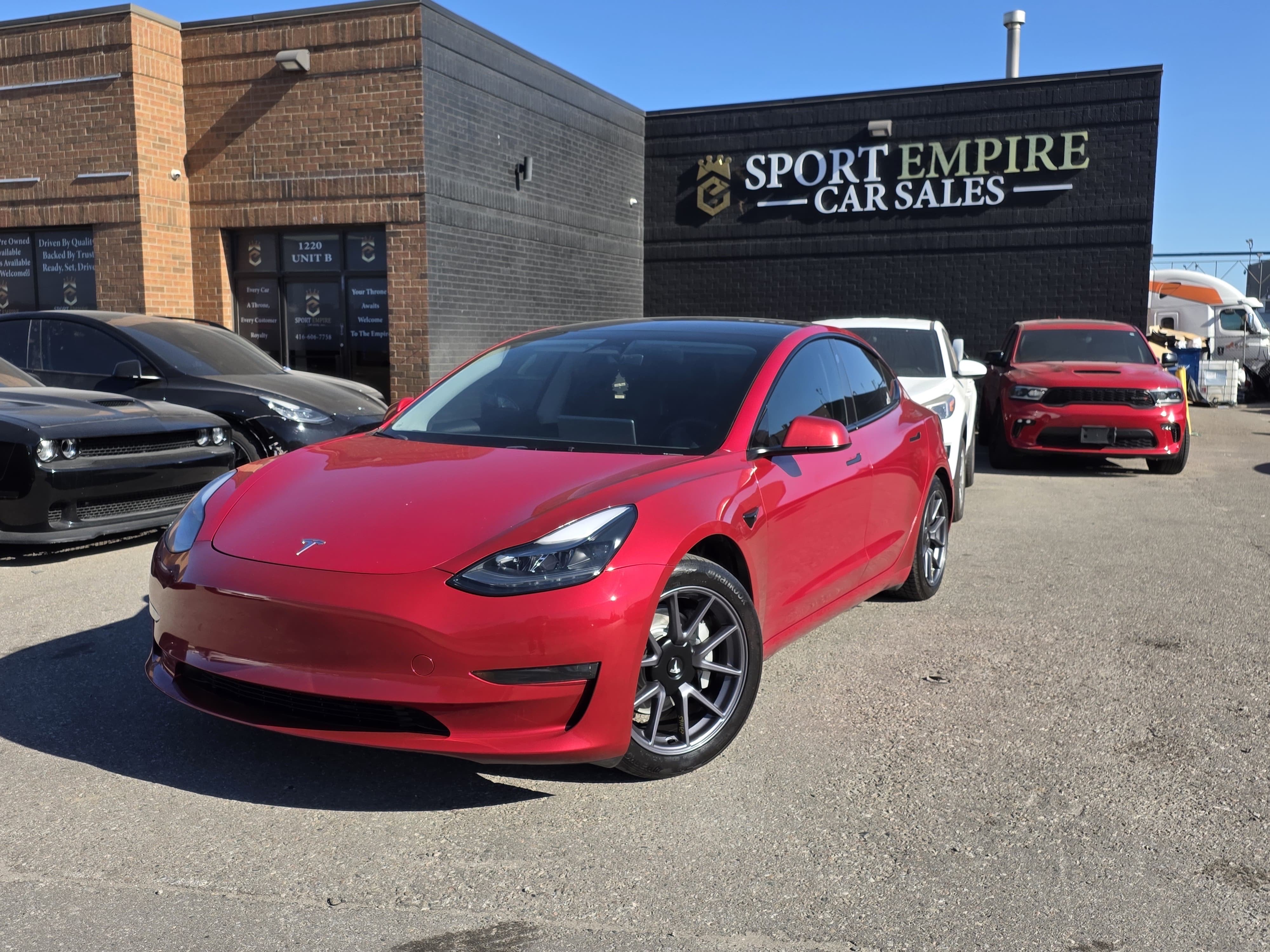 Red 2023 Tesla Model 3 Sedan All-Wheel Drive Automatic