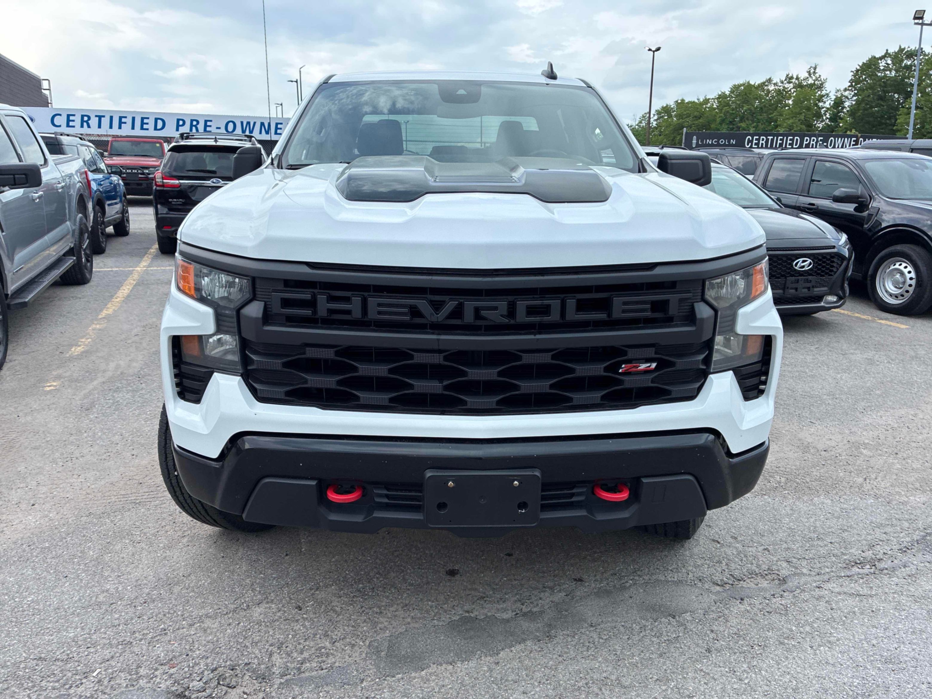White 2023 Chevrolet Silverado 1500 Custom Trail Boss Crew Cab 4WD Pickup Truck Four-Wheel Drive Automatic