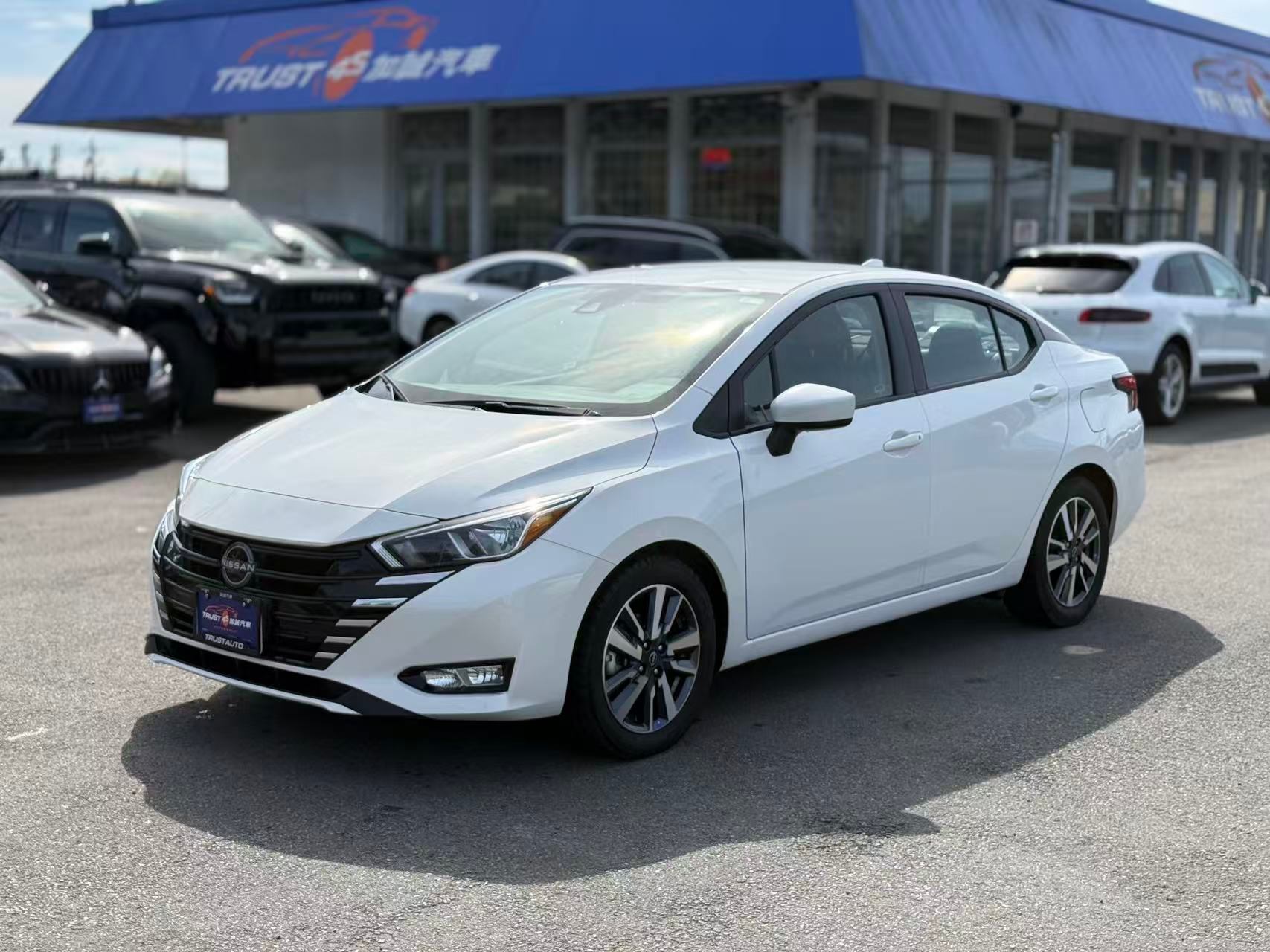 White 2024 Nissan Versa Sedan Front-Wheel Drive Automatic