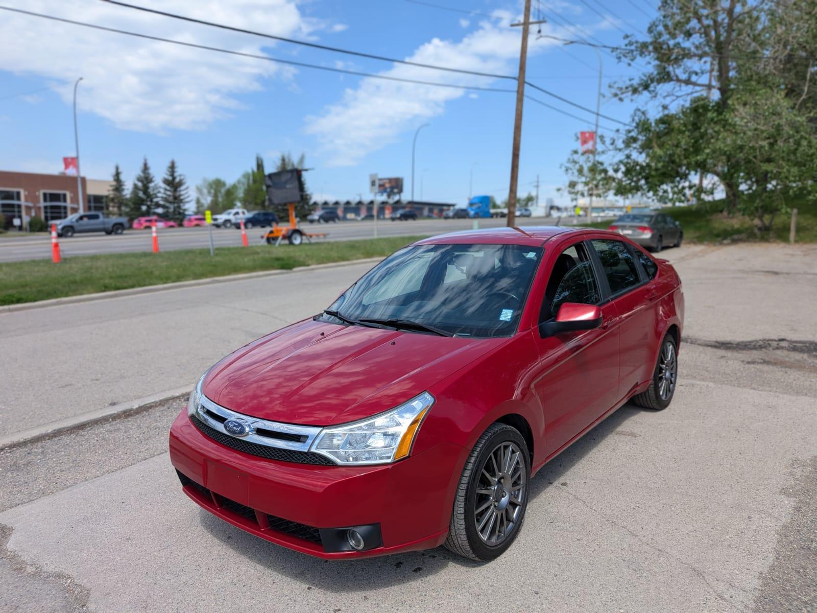 Red 2009 Ford Focus Sedan Front-Wheel Drive Automatic